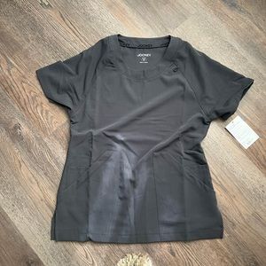 Brand new Jockey extra small scrub top